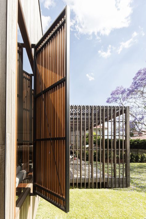 Sung Dobson House. Sun Shade Architecture Facades, Sun Louvers Architecture, Timber Rainscreen Cladding, Timber Sliding Window Screen, House Exterior Cladding, West Facing House, Rainscreen Cladding, Deck Shade, Outdoor Shutters