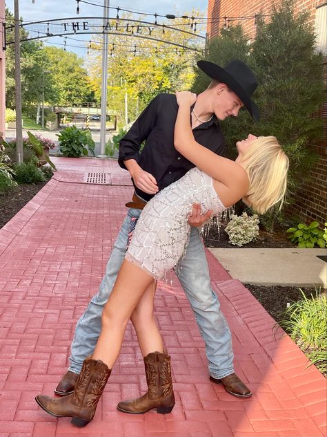 Short Cowboy Boots With Dress, Hoco Dress With Cowboy Boots, Homecoming Dresses With Cowboy Boots, Cowboy Hoco Outfit, Hoco Dress With Boots, Hoco Dresses With Cowboy Boots, Cute Hoco Pics With Date, White Hoco Dress Couple, Cowboy Homecoming