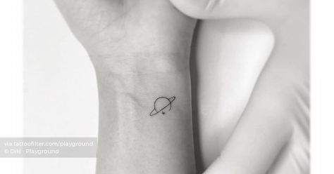 Minimalist Saturn tattoo on the wrist Saturn Wrist Tattoo, Saturn Return Tattoo, Saturn Tattoo Minimalist, Moon And Saturn Tattoo, Earth Tattoos, Edgy Tattoos, Taylor Tattoo, Tattoo On The Wrist, Space Saturn