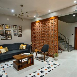 Contemporary House with a Simple Layout | Avasiti Design – The Architects Diary Timeless House Design, Modern Traditional Living Room Ideas, Modern Traditional Living Room, Jali Design, Timeless House, Partition Designs, Architecture Styles, The Architects Diary, Bali House