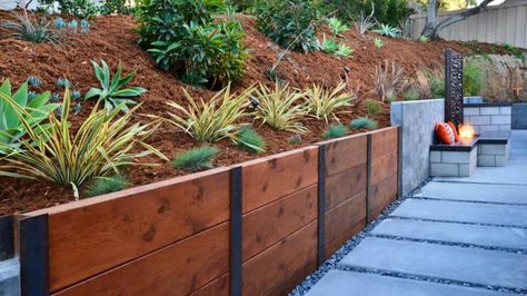 I beam wood retaining wall I Beam Retaining Wall, Wood Beam Retaining Wall, Wood And Stone Retaining Wall, Pressure Treated Retaining Wall, Metal Retaining Wall Ideas, High Retaining Wall Ideas, Fence With Retaining Wall, Retaining Wall Ideas Wood, Tall Retaining Wall Ideas