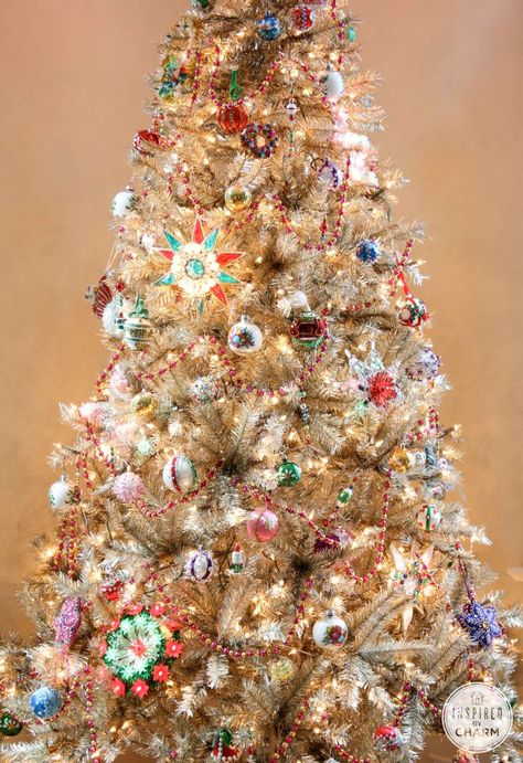 A gold tree dressed entirely in vintage ornaments! Check it out - Rockin’ Around the Vintage Christmas Tree | Inspired by Charm Vintage Inspired Christmas Tree, Best Christmas Tree Decorations, Vintage Christmas Tree Decorations, Tinsel Tree, A White Christmas, Unique Christmas Trees, Cool Christmas Trees, Navidad Diy, Beautiful Christmas Trees