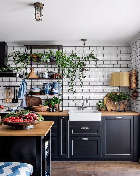 🖤 Dark Boho Kitchen Dreams: Where Edgar Allan Poe Meets Morticia Addams 🍳 Transforming my tiny kitchen into a moody culinary wonderland! Picture this: * Dramatic black cabinets with gleaming brass accents * Classic New York subway tiles for that urban edge * Open shelves showcasing my eclectic collection - glass skulls rubbing elbows with vintage lab beakers 🧪💀 * Shimmering copper pots ready for witchy brews (or just really good pasta) * Lush greenery breathing life into every corner 🌿 It’s a... Dark Boho Kitchen, White Metro Tiles, Butcher Block Ideas, Good Pasta, Blue Kitchen Cabinets, Metro Tiles, Interior Design Images, Eclectic Kitchen, Black Kitchen Cabinets