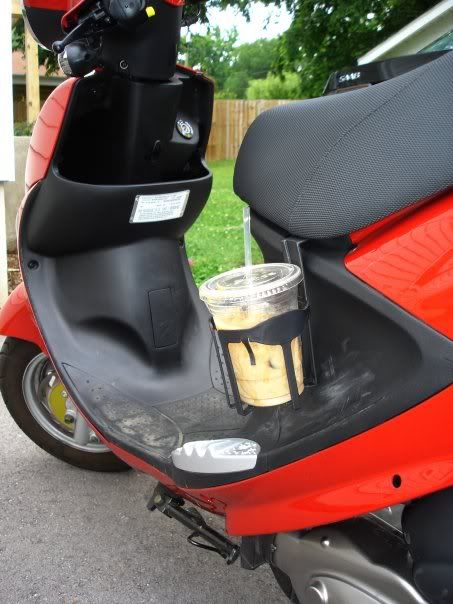 need a cup holder for your scooter. just get a car cup holder and hook it in your seat... why didn't i think of that ! Moped Scooter Accessories, Moped Accessories, Gas Moped, Vespa Accessories, Motorcycle Cup Holder, Simson Moped, Honda Metropolitan, 50cc Scooter, Moped Bike