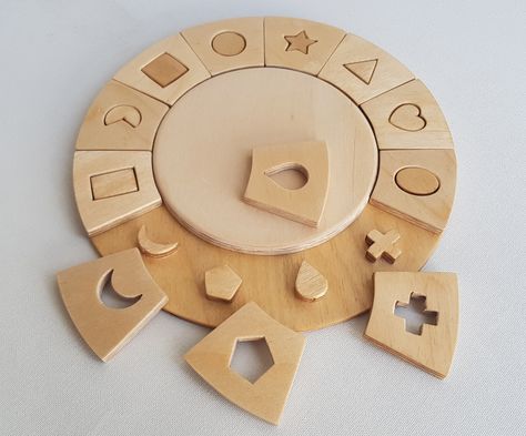 Wooden shapes puzzle pdf plans. This plans set will guide you how to make a shapes puzzle by scroll saw. Kids will love to play with this shapes puzzle. Wooden Shape Puzzle, Natural Wood Toys, Patterns For Kids, Wooden Toy Trucks, Montessori Diy, Wood Toys Plans, Wooden Toys Plans, Laser Cut Wood Crafts, Scroll Saw Pattern