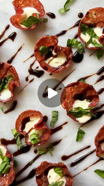 Corrina Cafarelli | The Charcuterie Queen on Instagram: "Baked Salami Cups✨  What you will need:  - Mini Cupcake Pan - Shot Glass  - Genoa Salami - Fresh Mozzarella  - Balsamic Glaze - Fresh Basil   Directions: Preheating your oven to 400°F and then add your salami into each space on your mini cupcake pan. I like to use a shot glass to press down the salami, it makes it a little bit easier.  Once you have all your salami in the pan place into the oven for about 10 minutes, until the salami gets super crispy.  While the salami is baking, this is where you will chop up your fresh mozzarella into smaller bite-size pieces. Take out the salami and then add in all of your small fresh mozzarella pieces and then bake together for another 5 to 7 minutes. Once they are all done, take them out and pu Baked Salami Appetizer, Salami Cups, Baked Salami, Mozzarella Balsamic, Salami Appetizer, Mini Cupcake Pan, Genoa Salami, Cupcake Pans, Mini Cupcake