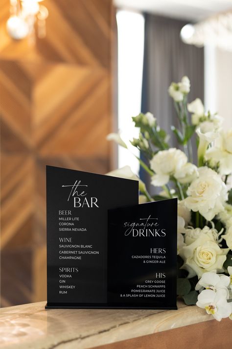 "Modern Black Acrylic Wedding Bar Sign - Signature Drink Sign - Wedding Bar Menu with Stand - Wedding Signage - Wedding Drink Menu Sign   Introducing our Modern Black Acrylic Wedding Bar Sign, the perfect addition to your wedding bar menu! Crafted from high-quality black acrylic, this elegant sign will add a touch of sophistication and modern style to your wedding reception. Featuring beautiful white lettering, this sign is designed to showcase your signature drink menu or bar menu in style. The Black Color For Wedding, Bar Area Wedding Reception, Wedding Sign Minimalist, Black And White Bar Sign Wedding, Black White And Gold Wedding Reception Decor, Black And White Acrylic Wedding Sign, Black Bar Sign Wedding, Modern Signature Drink Sign, Bar Menu Wedding Sign Acrylic