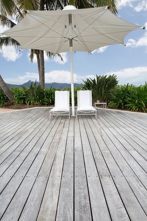 The trend for grey timber decks is more popular than ever. However, while simply leaving the timber untreated and open to the elements will achieve the grey look, you risk sacrificing… Spotted Gum Decking, Grey Deck, Wooden Pool, Oberirdische Pools, Laying Decking, Deck Flooring, Best Above Ground Pool, Deck Colors, Rustic Window