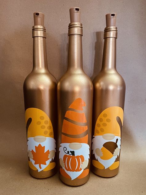 Thanksgiving Lights, Holiday Wine Bottle Crafts, Thanksgiving Wine Bottle, Decorate Bottles, Bottle Lighting, Christmas Bottles, Lighted Bottles, Fall Wine Bottles, Wine Bottle Lights