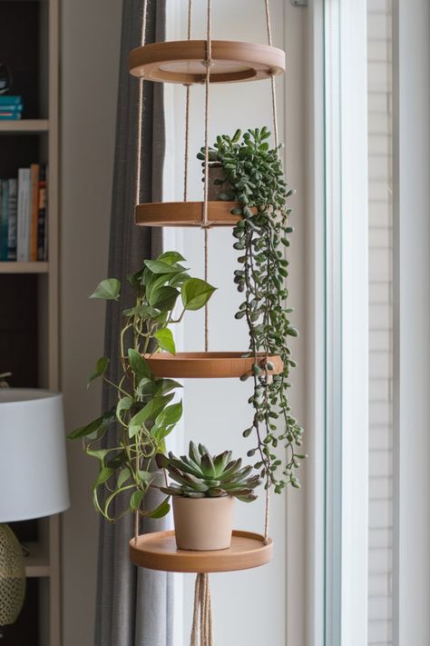 Add a touch of nature to your minimalist home with vertical greenery. Arrange floating shelves featuring modern ceramic or woven pots filled with vibrant plants, perfectly positioned to enhance natural light and clean aesthetics. #MinimalistGreenery #FloatingPlantShelves #ModernPlantDisplay #CleanAesthetic #NaturalHomeDecor #VerticalGreeneryDesign #IndoorPlantArrangement #MinimalistStyle #EcoChicHomes #ModernHomeInspo Plant Shelf Ideas, Plants Shelf, Plant Setup, Design With Rope, Indoor Plant Display, Modern Floating Shelves, Indoor Greenery, Window Plants, Wooden Trays