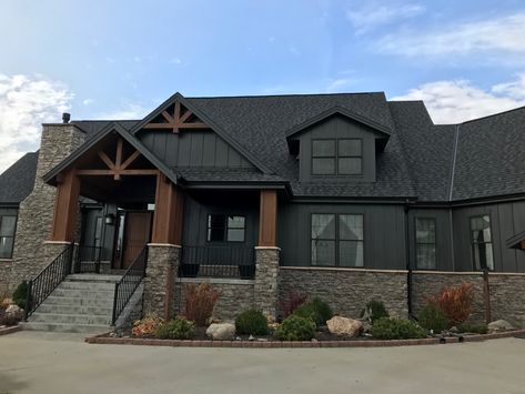 Sherwin Willams iron ore Dark Home Exterior Modern, Dark Gray Siding With Wood Accents, Mountain Craftsman Exterior, Black Home Exterior With Wood Accents, Vinyl House Exterior, Dark Craftsman Exterior, Black House With Stone, Barndo Colors, Black Craftsman House