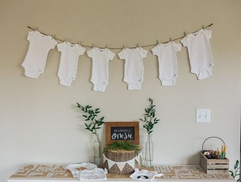 Decorate a Onesie Station. My husband and I cut out our own woodland animal stencils for guests to create the most darling onesies! Fireplace Baby Shower Decor, Decorate A Onesie, Simple Baby Shower Decorations, Onesie Decorating Station, Onesie Station, Animal Stencils, Onesie Decorating, Baby Shower Boho, Boy Baby Shower Ideas