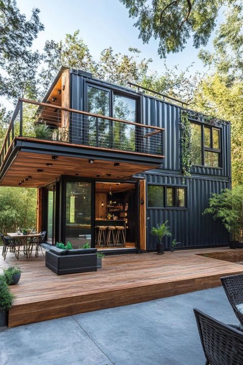 Two story house built with shipping containers with balcony and wooden porch. Check out these shipping container homes and learn their advantages, design appeal, and unique characteristics. Container Home With Deck, Three Container House, Shipping Container Homes Two Story, Container Homes Ideas Design Two Story, Two Story Container Home, 2 Story Container House, Two Story Adu, Roof With Windows, Container Home Floor Plan