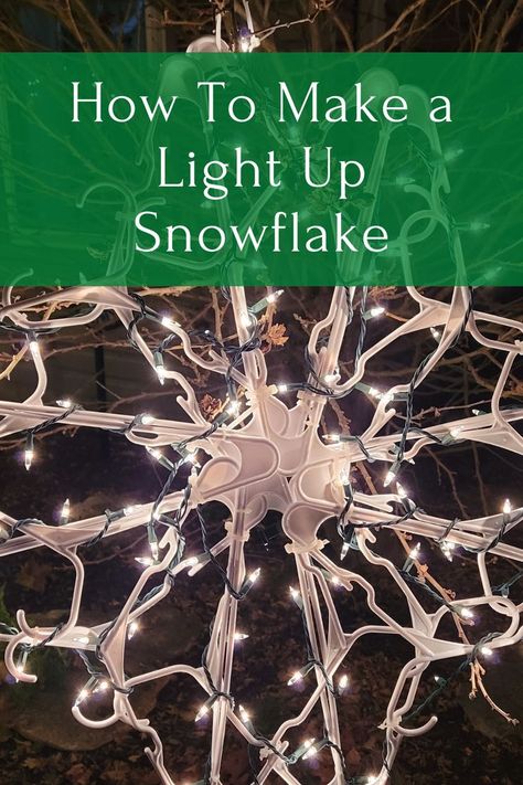 Easily Make a Lighted Snowflake Using Dollar Tree Hangers - The Daily DIY Snowflake Projector Lights, Snowflake Hangers With Lights, Outdoor Snowflake Decorations, Diy Christmas Light Tree Outdoor, Hanger Snowflakes Diy, Light Up Ornaments Diy, Diy Light Up Snowflakes, Net Lights Ideas Christmas Outdoor, Hanger Snowflake Diy With Lights