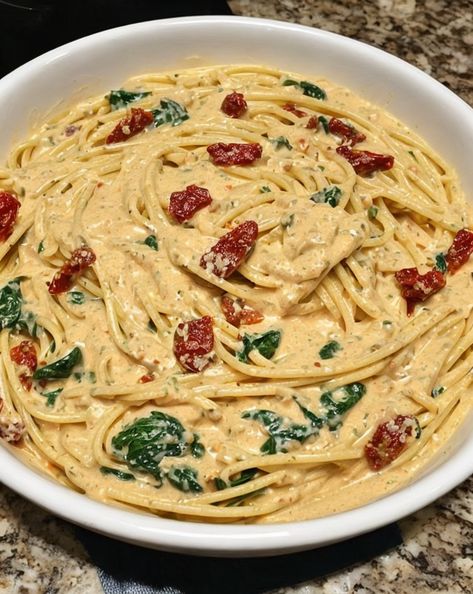 "Indulge in a flavorful twist on classic spaghetti with our Sun-Dried Tomato Cream Sauce recipe! Perfect for a quick and delicious dinner. #pasta #dinnerideas #Italiancuisine" Spaghetti With Sun Dried Tomatoes, Sun Dried Tomato Spinach Pasta, Spaghetti & Spinach With Sun-dried Tomato Cream Sauce, Sun Dried Pasta, Sun Dried Tomato Pasta Sauce, Creamy Sun Dried Tomato Pasta, Sun Dried Tomato Cream Sauce, Spaghetti Spinach, Tomato Cream Sauce Pasta