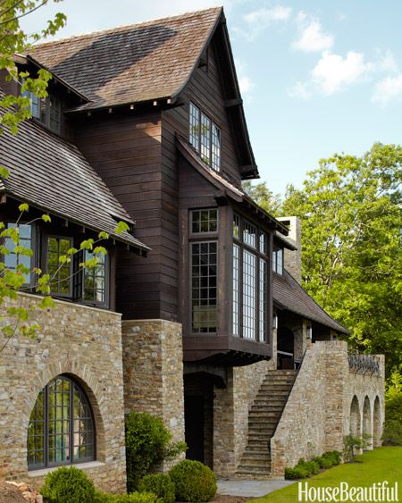 The rear façade features a staircase of Tennessee fieldstone that leads to a covered porch with an outdoor fireplace in a western North Carolina house. Tennessee Fieldstone, Ruard Veltman, Architecture Renovation, Gorgeous Houses, Casa Exterior, Appalachian Mountains, House Exteriors, Mountain Homes, Second Story