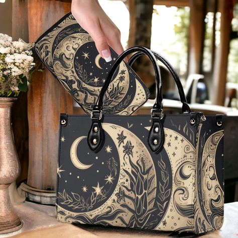 Witchy Cottagecore Moon Child Celestial top handles Vegan leather handbag purse with shoulder strap, Whimsical Pagan Mystical crossbody bag Handbag: Sizes: Small, Medium, Large, available  Material: Choose from top-rated vegan Leather with faux leather pattern. All-Over Printing: Unique Sense Forest style art. Convenient Carrying: Sturdy dual top handles for balance and comfort. Style Options: Removable and adjustable strap for versatile looks and crossbody style. Secure Closure: Smooth zipper c Witchy Cottagecore, Gothic Purse, Forest Style, Checkbook Wallet, Leather Pattern, Art Unique, Moon Child, Comfort Style, Handbag Purse