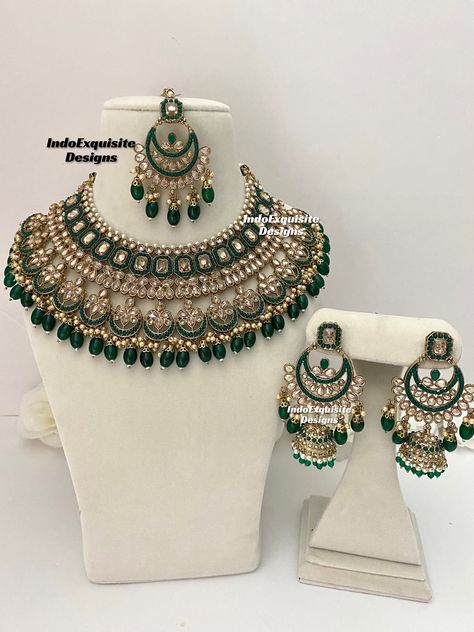 Elegant antique gold Polki bridal necklace set comes with beautiful jhumki earrings and tikka/Kundan Polki Necklace/Reception/Wedding/bridal jewelry/ Indian jewelry/Reverse AD Jewelry/Green All items are shipped from Brampton, Ontario, Canada. If you need your item by a certain day, please reach out to us for express delivery option before placing the order. We kindly request to consider minor variations in colors, shades, textures as pictures displayed may slightly vary from the actual product due to digital image limitations.Please expect the possibility of some minor imperfections when buying handmade jewelry. Please contact us for any questions you might have. Thank you and Happy shopping 😊 Green Colour Bridal Jewellery Set, Green Jewellery Set Indian, Emerald Green Bridal Jewelry Indian, Green Kundan Jewellery Bridal, Green Indian Jewellery, Green Bridal Jewellery Set, Green Bridal Jewellery, Green Jewellery Set, Gold Kundan Necklace