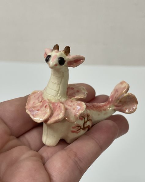 It’s a lil Cherry Blossom Dragon 🌸🐉🌸 This was a commission for my dear friend @crappyceramicss ! They provided me with such a fun prompt and trusted me to get creative 🥹💛 I had a blast and enjoyed making the lil trees hehe Air Dry Clay Dragon Tutorial, Clay Cherry Blossom Tree, Clay Cherry Blossom, Cherry Blossom Dragon, Lil Cherry, Cute Dragon Sculpture, Chinese Dragon Clay Sculpture, My Dear Friend, Get Creative