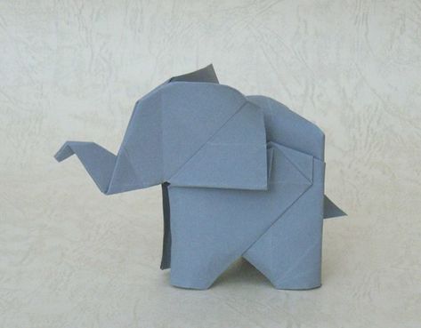 origami elephant | can anyone tell me who is the folder of t… | soneblees | Flickr Origami Elephant Tattoo, Dragon Origami, Origami Cube, Origami Elephant, Origami Gifts, Tutorial Origami, Origami Decoration, Origami Bookmark, Water Coloring