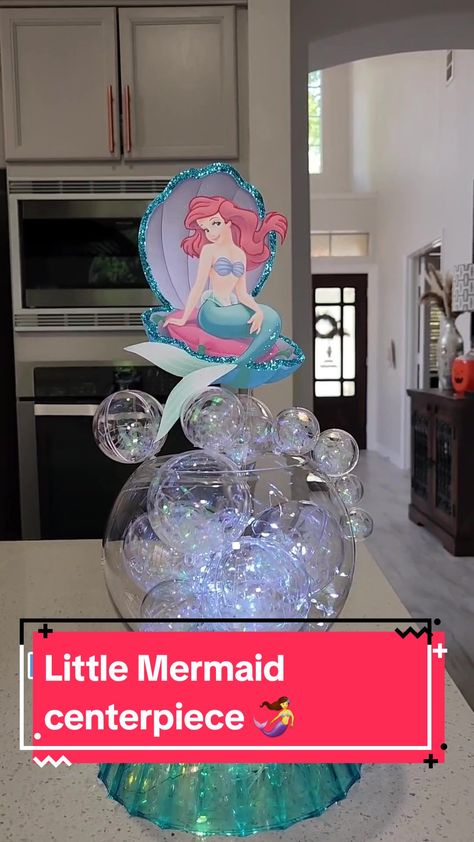 Mermaid Birthday Table Centerpieces, Ariel Table Centerpiece, Ariel Birthday Party Centerpieces, Mermaid Centerpiece Ideas Diy Simple, Ariel Table Decorations, The Little Mermaid Centerpieces, Dollar Tree Mermaid Party, Mermaid Birthday Centerpieces, Ariel Centerpieces Ideas