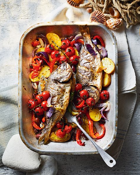 Roasting fish whole adds extra flavour and keeps it moist. In this Greek-inspired recipe, we’ve paired sea bream with oregano, Kalamata olives, garlic and cherry tomatoes for an all-in-one summer supper Sea Bream Recipes Whole, Bream Fish Recipe, Whole Rainbow Trout Recipe, Sea Bream Recipes, Rainbow Trout Recipe, Greek Fish, Roasted Fish, Trout Recipe, Summer Supper