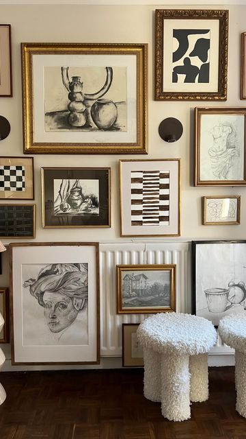 Denise | Interior stylist DIY and Home Hacks on Instagram: "Took me a while to get it right…. Gallery wall reveal! I always wanted to create a gallery wall on this wall, even though I had some frames here it was never done properly. I’ve been collecting frames for some time now, most of them are from my local charity shops. Always worth checking frames and books in their shops. Happy weekend! #gallerywall #mygallerywall #homeinspo #homestylemag #idealhome #gallerywallinspo #gallerywallideas" Black And White Portrait Gallery Wall, Dining Nook Gallery Wall, Mixed Metal Gallery Wall, Midcentury Gallery Wall Ideas, Chain Gallery Wall, Abstract Art Gallery Wall, Modern Gallery Wall Ideas, Parisian Gallery Wall, Modern Gallery Wall Living Room