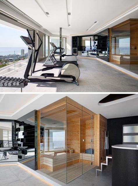 In this modern home gym, there's a spa bathroom with a sauna and chiller bath. Mirrors above a vanity reflect the view outside. #ModernHomeGym #Sauna #ModernGym Home Gym And Spa, Home Gym Modern, Gym Modern, Modern Home Gym, Bath Mirrors, Home Spa Room, Dream Home Gym, Built In Bath, Gym Room At Home