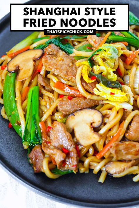 Shanghai Style Fried Noodles is made with chewy thick noodles, juicy pork slices, garlic, chilies, mushrooms, cabbage, other veggies and stir-fried in a mouthwatering savory-sweet sauce! It’s quick and easy to make in 25 minutes, customizable with your favorite protein and veggies, and perfect for busy weeknights! #shanghainoodles #noodles #dinner #betterthantakeout #easyrecipes #stirfriednoodles #stirfry #asianfood #chinesefood | That Spicy Chick Asian Egg Noodle Recipes Stir Fry, Pork Fried Noodles Stir Fry, Mushroom Noodle Stir Fry, Ground Pork Stir Fry Noodles, Egg Noodle Stir Fry, Mushroom Stir Fry Noodles, Shanghai Noodles, Pork Broccoli, Fried Spaghetti