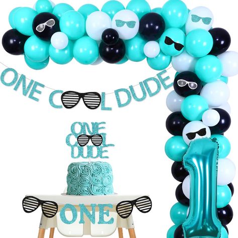 PRICES MAY VARY. 【What You Will Get】: 55 latex balloons 12 inches(30 teal blue, 10 black, 10 white), 15 latex balloons 5 inches(5 black, 5 white, 5 teal blue),1 ONE COOL DUDE banner, 1 ONE COOL DUDE cake topper, 1 cool sunglasses highchair banner, 6 sunglasses stickers, 1 number 1 foil balloon 32 inches, 1 balloon tape strip 16.4 ft, 100 adhesive dots. 【One Cool Dude 1st Birthday Decorations】: Black teal and white balloon garland kit with One Cool Dude cake topper and banner, highchair banner an Birthday Decorations Black, Birthday Balloon Garland, One Cool Dude, Number 1 Balloon, First Birthday Balloons, 1 Balloon, Cool Dude, Party Themes For Boys, Highchair Banner