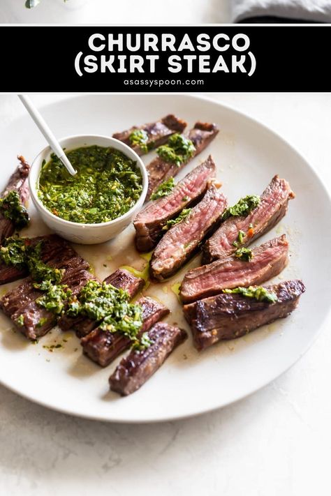 Churrasco is a Latin American term for a long flat cut of skirt steak that's marinated in a citrus-garlic mojo marinade and grilled to juicy perfection. This tender steak is then served with a delicious chimichurri sauce. Churrasco Steak Recipe, Churrasco Steak, Skirt Steak With Chimichurri, Skirt Steak Recipe, Mojo Marinade, Steak With Chimichurri, Spicy Fish Tacos, Marinated Skirt Steak, Steak With Chimichurri Sauce