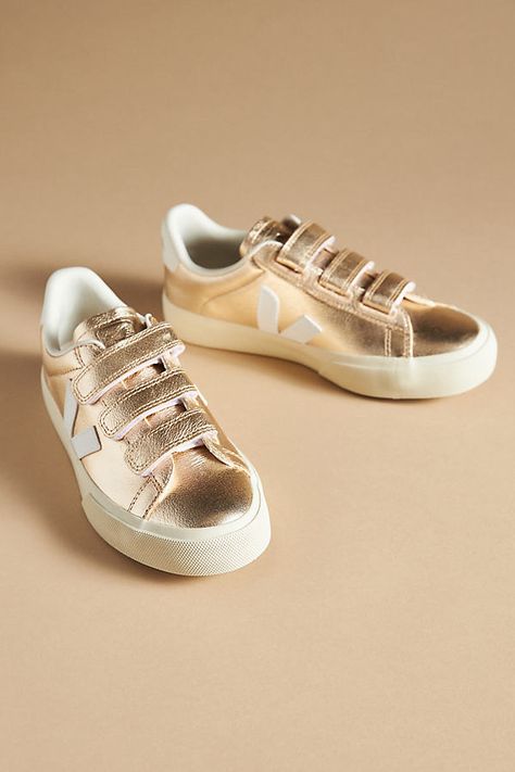 * SUSTAINABLE STYLE: Chrome-free leather upper* Recycled polyester insole* Recycled rubber sole* Hook-and-loop styling* Imported Gold Sneakers Outfit, Dressy Sneakers, Rose Gold Accessories, Gold Sneakers, Veja Sneakers, Yellow Shop, Sustainable Style, Shades Of Gold, Shoe Fits