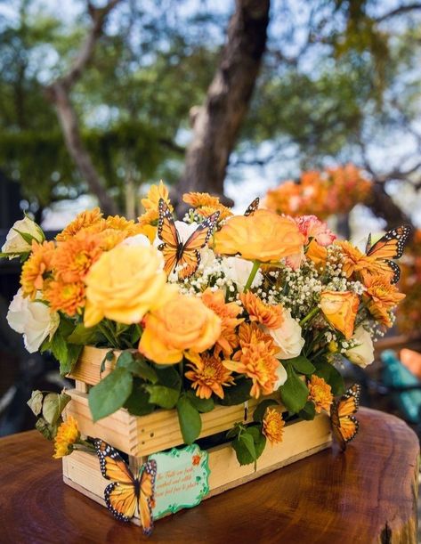 Butterfly Garden Party Centerpieces, Monarch Party Theme, Orange Theme Table Decor, Orange Theme Centerpieces, Monarch Butterfly Birthday Party Decorations, Monarch Butterfly Centerpiece, Orange Flower Centerpieces Wedding, Sunflower And Butterfly Party Theme, Floral Arrangements With Butterflies