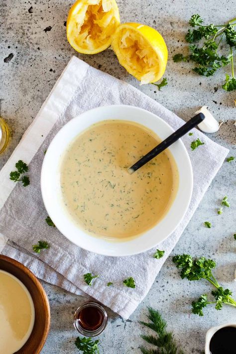 This Vegan Tahini Goddess Dressing gets its punchy flavour from fresh herbs, lemon juice, garlic, and a touch of sesame oil and soy sauce. Ready in 10 min. Healthy Homemade Salad Dressing Recipes, Goddess Dressing Recipe, Homemade Salad Dressing Healthy, Dressing Recipes Thanksgiving, Goddess Dressing, Salad Dressing Recipes Homemade, Recipes Thanksgiving, Vegan Sauces, Homemade Salads