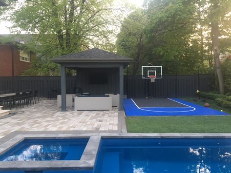 Basketball In Backyard, Pool And Basketball Court Small Backyard, Pool With Basketball Court, Basketball Court Backyard Ideas, Home Outside Basketball Court, Small Sport Court Backyard Ideas, Backyard Layout With Pool And Playground, House With Basketball Court Outside, Basketball Court Backyard Landscaping