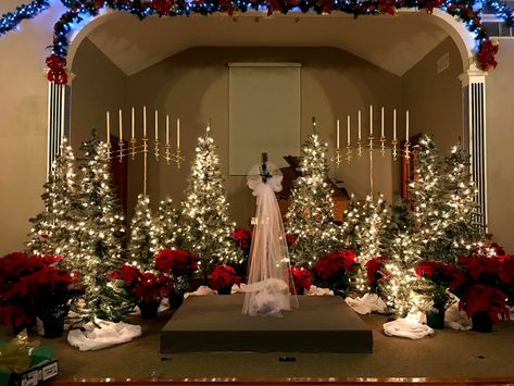 Wedding Cross Altar Christmas, Christmas Tree Altar Wedding, Christmas Themed Wedding Ceremony Decor, Christmas Wedding Arch Ceremony Backdrop, Christmas Wedding Photography, Christmas Tree Wedding Backdrop, Christmas Wedding Backdrop, Winter Wedding Candles, Christmas Wedding Ceremony