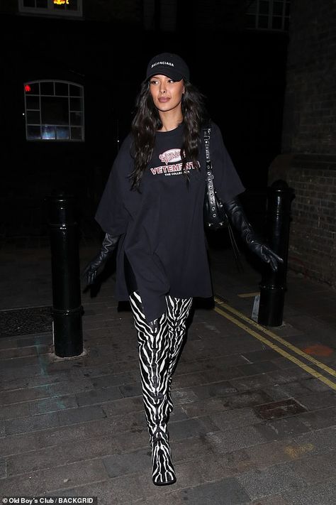 Maya Jama puts on a stylish display as she steps out in quirky zebra print boots | Daily Mail Online Zebra Boots Outfit, Zebra Print Boots, Zebra Boots, Mom Influencer, Huge Diamond Rings, Balenciaga Cap, Maya Jama, Leather Thigh Boots, Print Boots