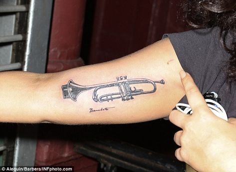 Proud: The artist who sketched the instrument signed his work so Gaga included the signature on her arm Trumpet Tattoo, Lady Gaga Tattoo, Native Tattoos, Cool Arm Tattoos, Upper Arm Tattoos, Arm Tattoos For Women, Arm Tattoos, Tattoo Parlors, Tattoo Blog