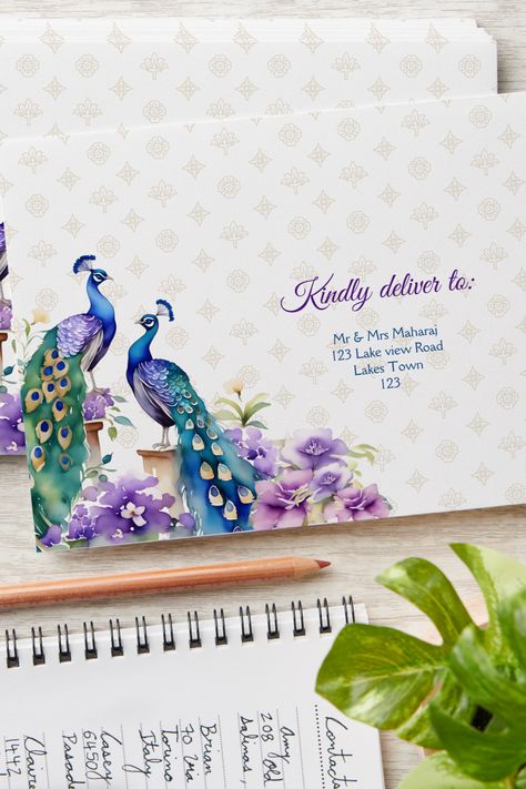 Peacock purple flowers Indian wedding Envelope Flowers Indian Wedding, Purple Jasmine, Peacock Cakes, Wedding Invitations Indian, Peacock Invitations, Flowers Indian, Watercolor Indian, Hindu Wedding Invitations, Wedding Invitations Ideas