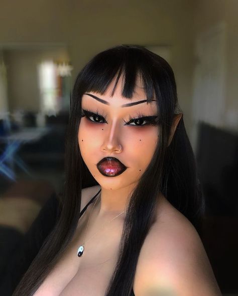 Cute Lil Face Tattoos, Spring Summer 2023 Nail Trends, Goth Bratz Makeup, Black Women Vampire, Dark Alt Makeup, Alt Birthday Makeup, Cross Makeup Look, Emo Makeup Black Women, Vampire Makeup Black Women