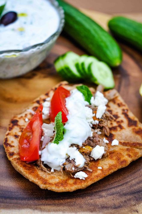 These roast beef gyros with tzatziki sauce are the best way to use up leftover roast beef! Filled with all your favorite Greek flavors and smothered with tangy creamy tzatziki, these gyros take mere minutes to assemble. #greekfood #gyros #roastbeef #tzatziki #tzatzikisauce Beef Gyros, Greek Sauce, Beef Gyro, Dinner Board, Leftover Roast Beef, Gyro Recipe, Homemade Tzatziki Sauce, Leftover Recipes, Leftover Beef