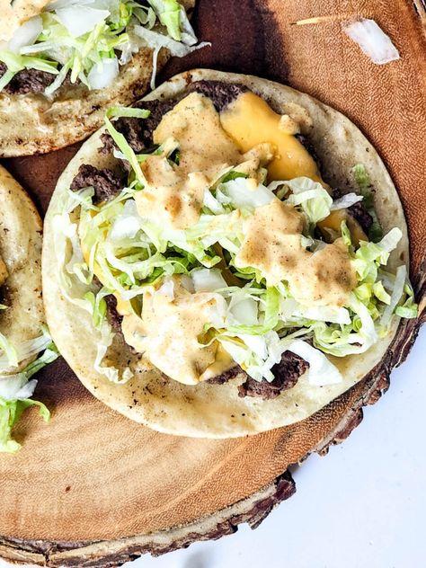 Cheeseburger Tacos - This Little Home of Mine Easy Taco Recipe, Velvet Taco, Cheeseburger Tacos, Easy Taco Recipes, Crispy Beef, Tortilla Shells, Beef Patties, Tortilla Press, Burger Press