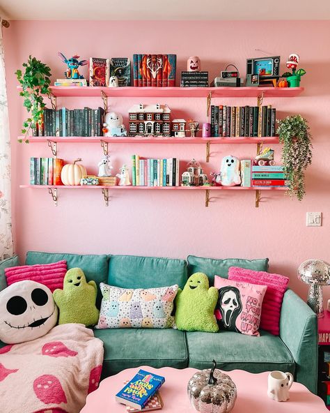 bet ya didn’t know i’d end up painting the shelves pink 😅🤭 we still need touch up some paint on the bottom of the shelves, but this was the last wall in my library that needed to be worked on & we basically finished it last night! my whole library is now officially done (for now lmao) & looks so fun from every angle 😭 spending time in here heals me 💞 its full of all of my favorite things & that’s so cool?? i have books, legos, a cozy gaming setup, puzzles, a comfy reading spot, a bookshelf... Maximalist Shelves, Eclectic Bookshelf Styling, Girly Library, Pastel Bookshelf, Bookshelves Inspiration, Colorful Maximalism, Cozy Gaming Setup, Reading Bedroom, Bookshelf Inspiration