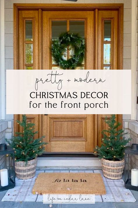 Elevate your home's holiday curb appeal with simple and modern Christmas front porch decor ideas! From stylish front door decorations to modern porch decor, discover creative ways to welcome the season. Explore chic front porch mats and exterior Christmas decorations to make a festive statement. Minimal Front Door Christmas Decor, Front Stoop Christmas Decor Ideas, Simple Christmas Door Decor, Front Door Holiday Decor, Front Steps Christmas Decor, Modern Christmas Front Porch Decor, Modern Christmas Front Porch, Christmas Decor Ideas Front Door, Simple Front Porch Christmas Decor Ideas