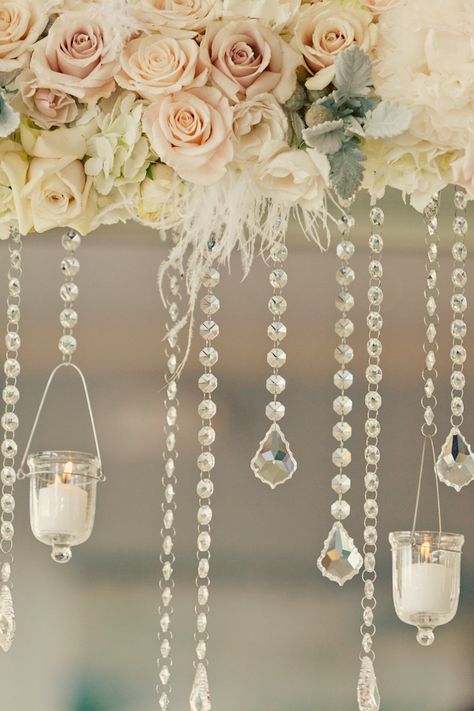 Branch with hanging tea lights centerpiece To hang over buffet table?  Different colors of course Hanging Candle Holders, Tea Lights Centerpieces, Hanging Tea Lights, Hanging Wedding Decorations, Lighted Centerpieces, Hanging Candle Holder, Crystal Garland, Hanging Candle, Wedding Ceremony Ideas