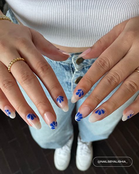 A bright royal blue polish with a crelly finish. Mykonos Nails Designs, Blue Hoco Nails Almond, Nails Royal Blue Design, Nails For Santorini, Electric Blue And White Nails, Nail Art Royal Blue, Greece Vacation Nails, Euro Summer Nails 2024, Croatia Nails Ideas