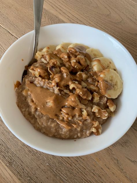 Delicious oatmeal
- 50 grams oats
- water (how much u like)
- 1 banana (half of it on top)
- 1/2 teaspoon cinnamon (or more :))
- pinch of salt
- 15 grams of walnuts 
- drizzle of peanut butter Walnuts Aesthetic, Walnut Aesthetic, Christmas Oatmeal, Healthy Aesthetic Breakfast, Oats With Peanut Butter, Oatmeal Dinner, Oats Water, Banana Bread Oatmeal, Peanut Butter Banana Oats