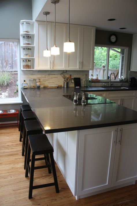 A one-level breakfast bar easily doubles as a prep station. Description from pinterest.com. I searched for this on bing.com/images Kitchen Peninsula Shelves, Extended Countertop Bar, Extended Breakfast Bar, Kitchen Peninsula Cabinet Ideas, Kitchen Peninsula With Seating For 4, Kitchen Island Coming Out From Wall, Extra Wide Kitchen Peninsula, Kitchen Bar With Cabinets Underneath, Kitchen Peninsula With Cooktop