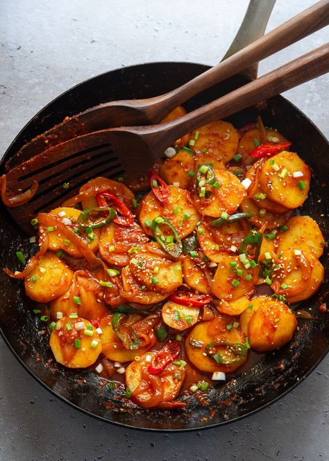 Spicy braised potatoes, or Maeun Gamja Jorim, are a hearty Korean side dish with tender potatoes braised in a flavorful gochujang sauce. Korean Potato Side Dish, Gamja Jorim, Braised Potatoes, Gochujang Sauce, Korean Side Dishes, Dump Meals, Potato Sides, Potato Side Dishes, Spicy Sauce