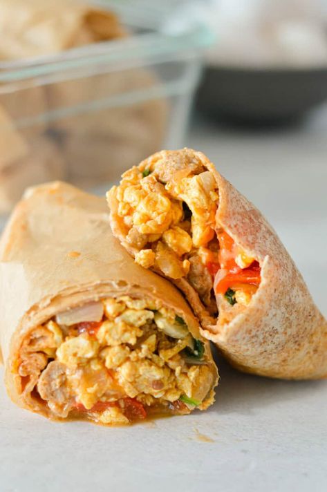 Close up of egg and cheese breakfast burritos. Egg And Cheese Burrito, Breakfast Burrito Meal Prep, Burrito Meal Prep, Egg And Sausage Breakfast, Potato Burrito, Dorm Cooking, Egg And Sausage, Egg White Breakfast, Frozen Burritos